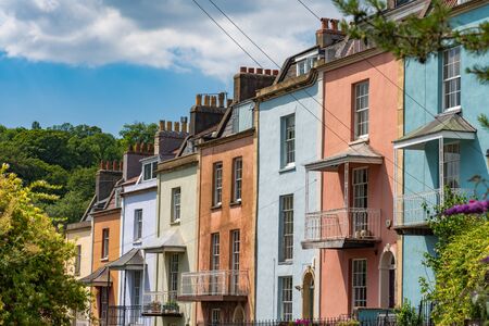BRISTOL, UNITED KINGDOM - JULY 03: The exterior architecture of a row of colourful houses on July 03, 2019 in Bristolの写真素材