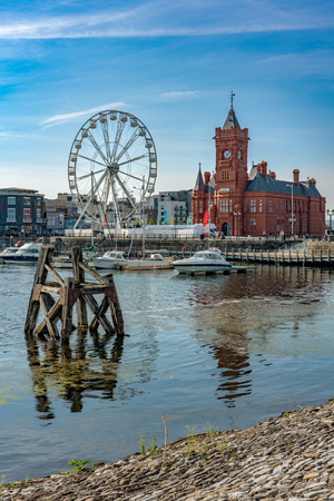 CARDIFF, UNITED KINGDOM - JULY 04: This is a view of the Pierhead Building and ferris wheel at Cardiff Bay on July 04, 2019 in Cardiffのeditorial素材
