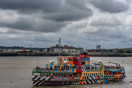 LIVERPOOL, UNITED KINGDOM - AUGUST 11: This is the MV Snowdrop ferry, a colorful boat known for its artistic design on the River Mersey  on August 11, 2019 in Liverpoolのeditorial素材