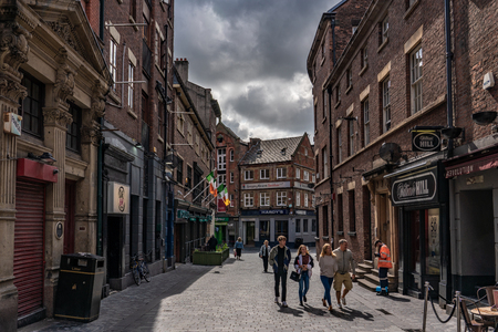 LIVERPOOL, UNITED KINGDOM - AUGUST 13: Temple Court Street, a bar street in the famous Cavern Quarter, a popular tourist destination on August 13, 2019 in Liverpoolのeditorial素材