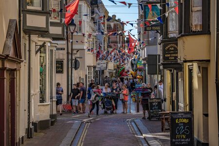 WEYMOUTH, UNITED KINGDOM - AUGUST 30: Shopping street with traditional British buildings near Weymouth Docks on August 30, 2019 in Weymouthのeditorial素材