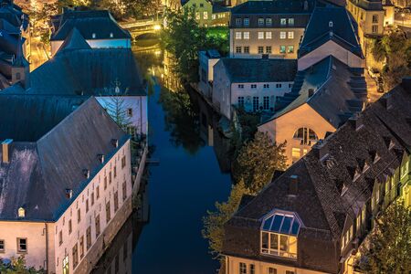 LUXEMBOURG CITY, LUXEMBOURG - SEPTEMBER 21: This is an evening view of old town historic architecture along the river Alzette on September 21, 2019 in Luxembourgのeditorial素材