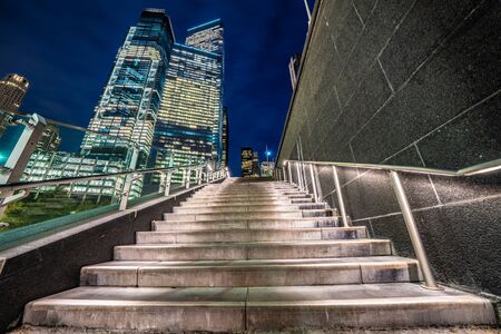 NEW YORK, USA - OCTOBER 10: Stairs leading to Liberty Park and skyscrapers city buildings in the financial district area on October 10, 2019 in New Yorkのeditorial素材