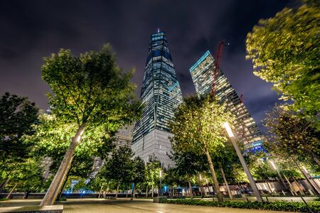 NEW YORK, USA - OCTOBER 10: Night view of the One World Trade Center, a famous landmark building in...