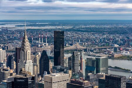 NEW YORK, USA - OCTOBER 12: View of downtown city skyscrapers in Manhattan with the east river in the distance on October 12, 2019 in New Yorkのeditorial素材