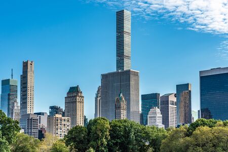 NEW YORK, USA - OCTOBER 12: View of high rise city buildings in midtown Manhattan from Central Park on October 12, 2019 in New Yorkのeditorial素材