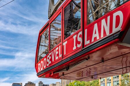 NEW YORK, USA - OCTOBER 13: This is a cable car arriving in Roosevelt Island, a popular tourist...