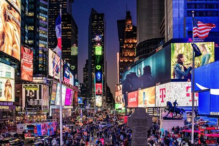 NEW YORK, USA - OCTOBER 15: Night view of the famous Times Square shopping and entertainment area in...