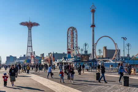 NEW YORK, USA - OCTOBER 14: View of the famous seaside Boardwalk in Coney Island, a popular tourist destination on October 14, 2019 in New Yorkのeditorial素材