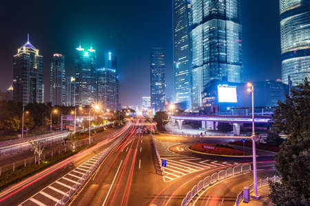 SHANGHAI, CHINA, OCTOBER 28: Night view of a downtown road with light trails in the Lujiazui financial district on October 28, 2019 in Shanghaiのeditorial素材