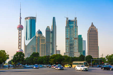 SHANGHAI, CHINA, OCTOBER 30: View of iconic skyscrapers and a city street in the Lujiazui financial...