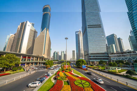 SHANGHAI, CHINA, OCTOBER 30: City street with modern high rise buildings in the Lujiazui financial district in Pudong on October 30, 2019 in Shanghaiのeditorial素材