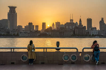 SHANGHAI, CHINA, OCTOBER 30: View of The Bund taken from the Lujiazui riverside park viewing platform during sunset on October 30, 2019 in Shanghaiのeditorial素材