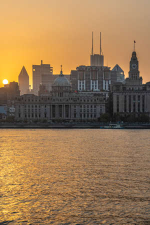 SHANGHAI, CHINA, OCTOBER 30: View of historic riverside architecture and city buildings on The Bund during sunset on October 30, 2019 in Shanghaiのeditorial素材