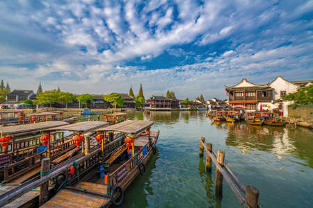 SHANGHAI, CHINA, NOVEMBER 01: Traditional Chinese Boats docked along the riverside at Zhujiajiao...
