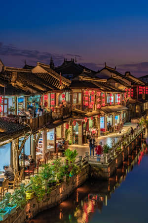 SHANGHAI, CHINA, NOVEMBER 01: Historic riverside buildings in Zhujiajiao ancient water town in the evening on November 01, 2019 in Shanghaiのeditorial素材