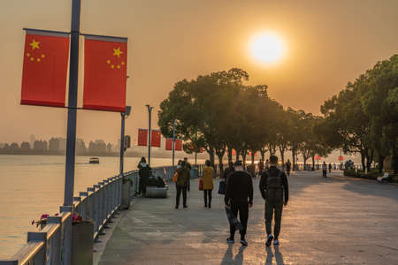 SUZHOU, CHINA- NOVEMBER 05: This is a lakeside park on Jinji Lake, a popular tourist destination during sunset on November 05, 2019 in Suzhouのeditorial素材