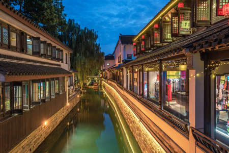 SUZHOU, CHINA- NOVEMBER 06: Evening view of traditional Chinese buildings along the river at Pingjiang Road ancient town on November 06, 2019 in Suzhouのeditorial素材