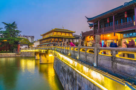 NANJING, CHINA - NOVEMBER 07: Evening view of a bridge along the river in the Fuzimiao historic district on November 07, 2019 in Nanjingのeditorial素材
