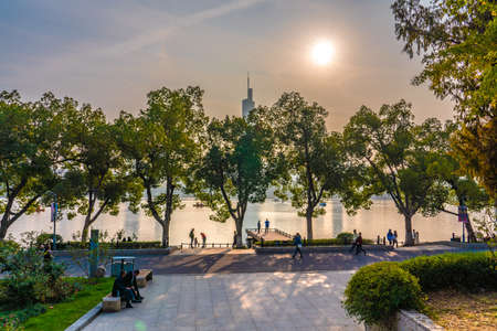 NANJING, CHINA - NOVEMBER 08: View of the lakeside park at Xuanwu Lake, a popular tourist destination on November 08, 2019 in Nanjingのeditorial素材