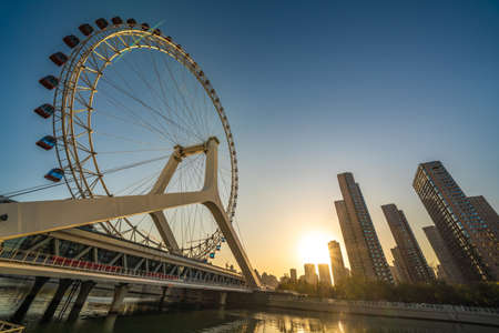 TIANJIN, CHINA - NOVEMBER 19:  This is the Tianjin Eye, a popular tourist destination on the Hai River on November 19, 2019 in Tianjinのeditorial素材