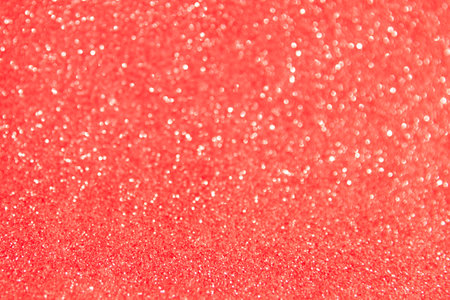 Glitter sparkling red texture. Beautiful Christmas and new year bokeh blurred backgroundの写真素材