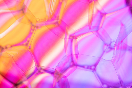 Bubble structure, gradient abstract background in pink and yellowの写真素材