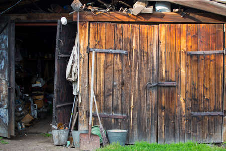 abandoned wooden barn in a villageの写真素材