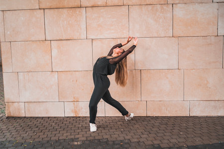 Woman stretching on streetの写真素材