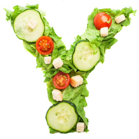 Y letter made with salad isolated on whiteの写真素材