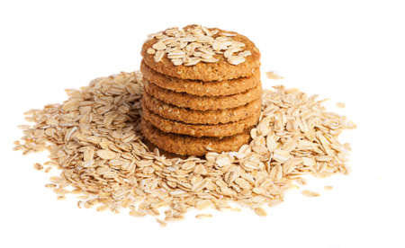 heap of oats and biscuits on a white backgroundの写真素材