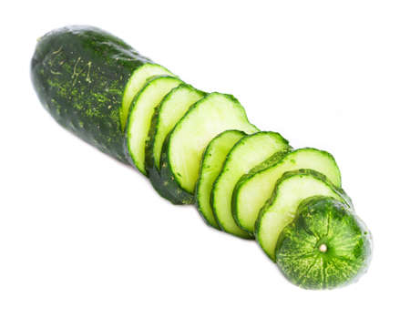 thin sliced cucumber on a white backgroundの写真素材