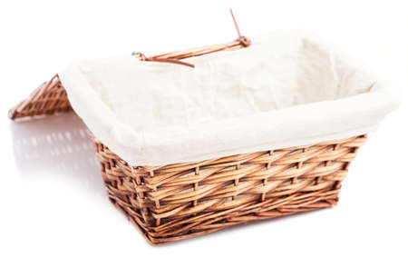 wicker basket isolated on a white backgroundの写真素材