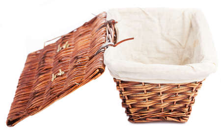 wicker basket isolated on a white backgroundの写真素材