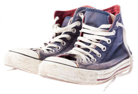 pair of blue chuks on a white backgroundの写真素材