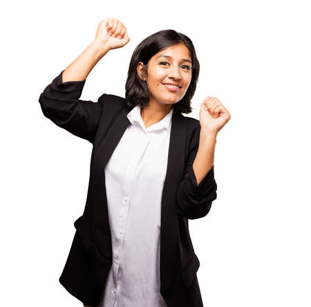 latin business woman doing winner gestureの写真素材