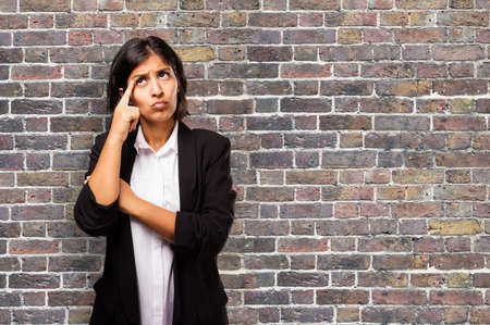 latin business woman thinkingの写真素材