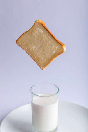 Closeup bread top milk glass