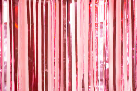 Pink and maroon party glitter curtain backgroundの写真素材