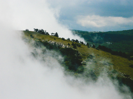 beautiful landscape with a lot of fogの写真素材