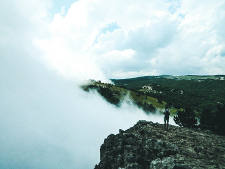 Man on a cliffの写真素材