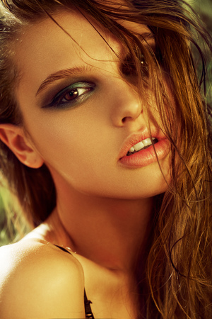 Beautiful girl in the sunshine, great makeupの写真素材