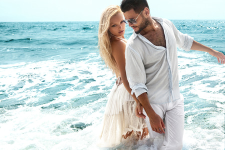 Romantic couple on the beachの写真素材