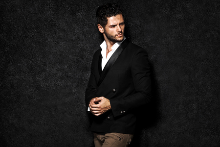 Handsome man posing, night life.の写真素材