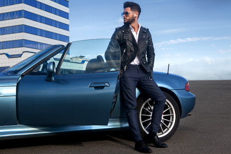 Handsome man near the car.の写真素材