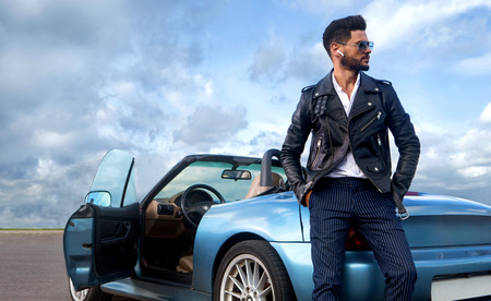 Handsome man near the car.の写真素材