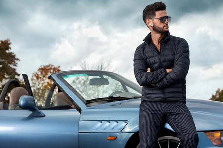 Handsome man near the car.の写真素材