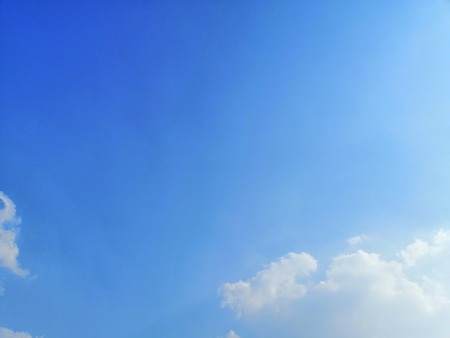 Clear blue sky and cloud background wallpaperの写真素材