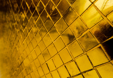 Beautiful closeup textures abstract tiles painting and gold and colorful glass wall background and...