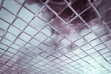 Beautiful closeup textures abstract tiles and silver and white color glass wall background and...
